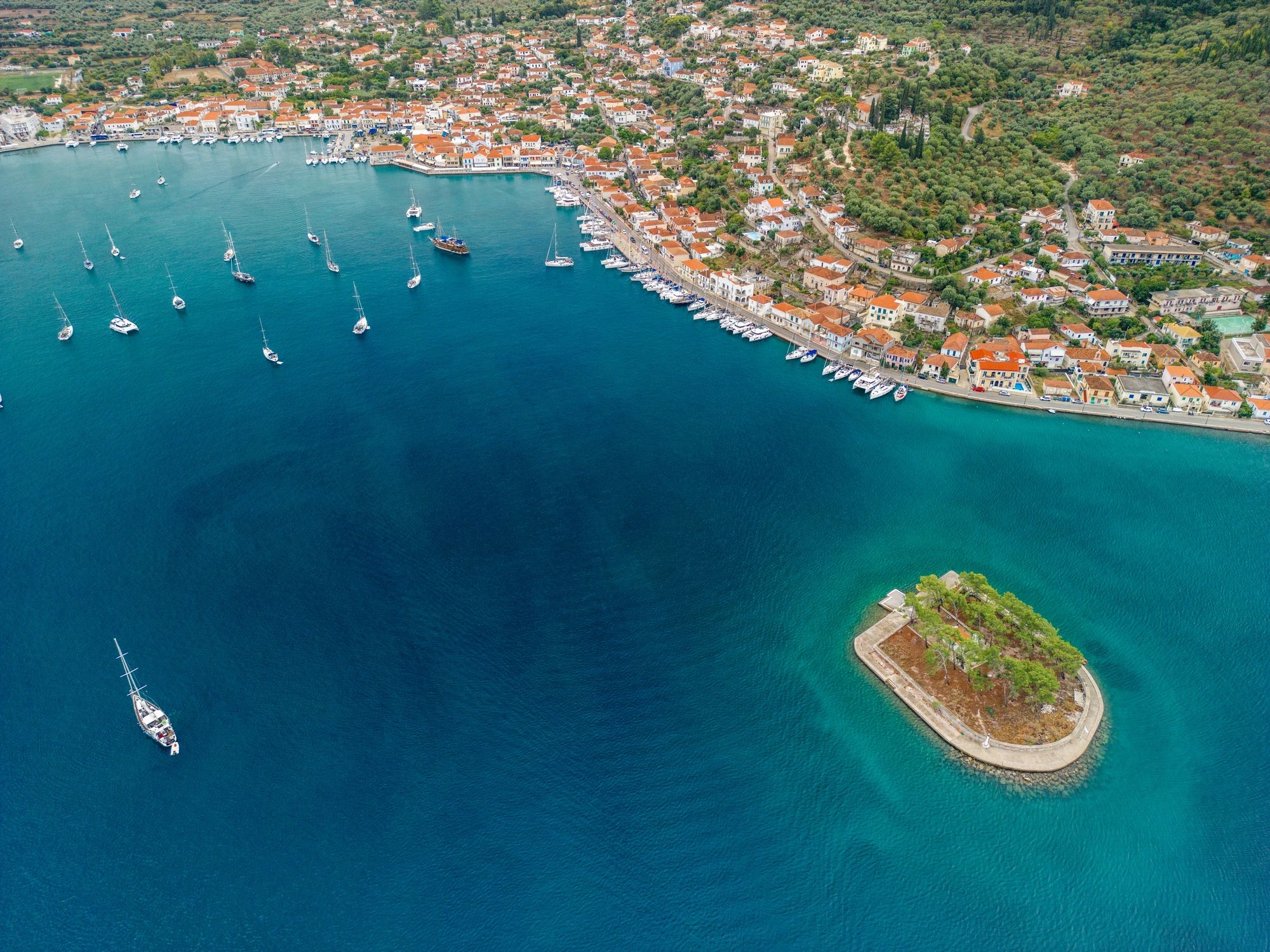 Open water with anchored sailboats