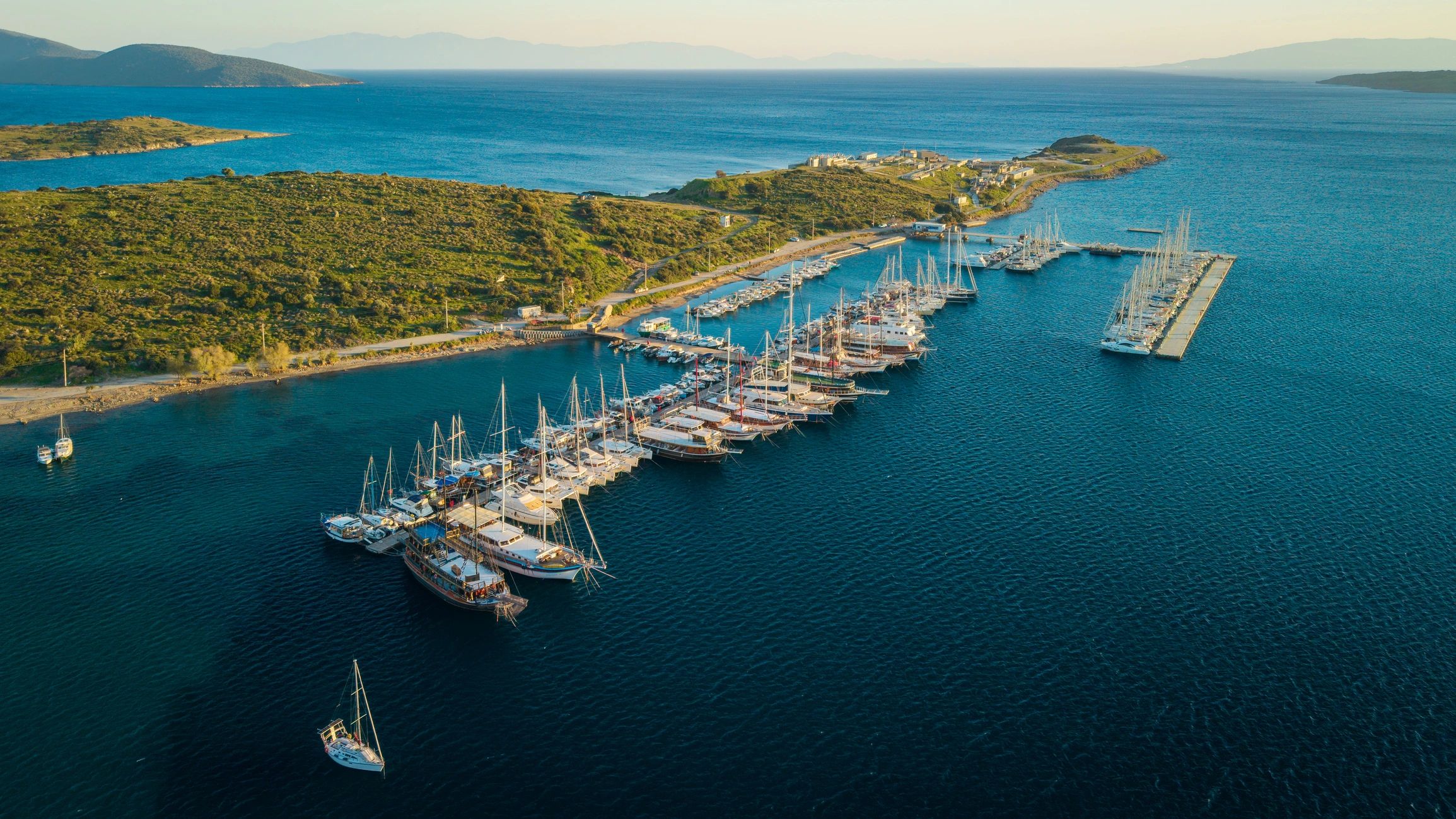 Aerial view of luxury yachts docked in a marina